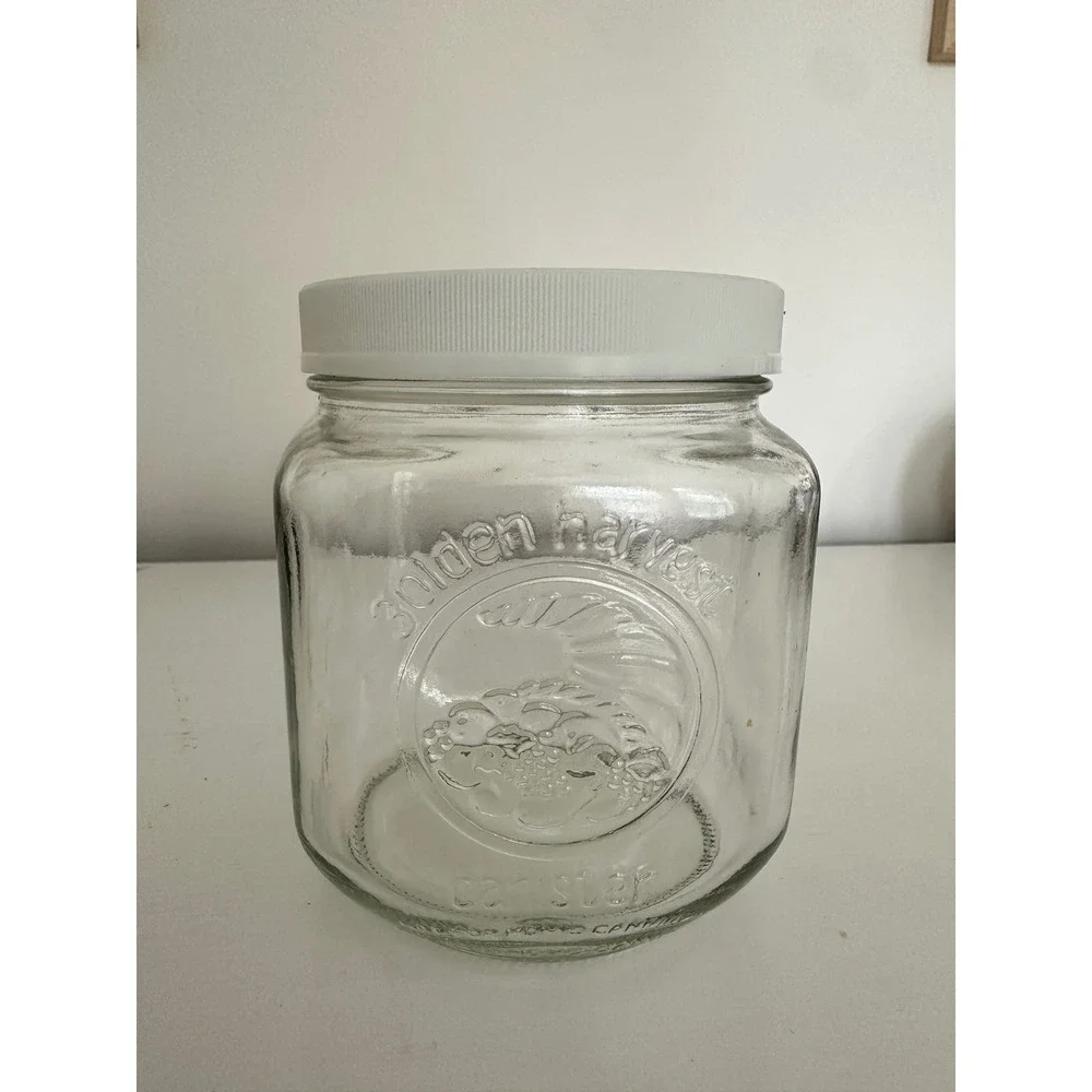 Golden Harvest Glass Canister Jar with White Lid Embossed Fruit Design 5.5 Inch